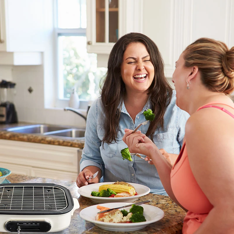 two women enjoying their meal